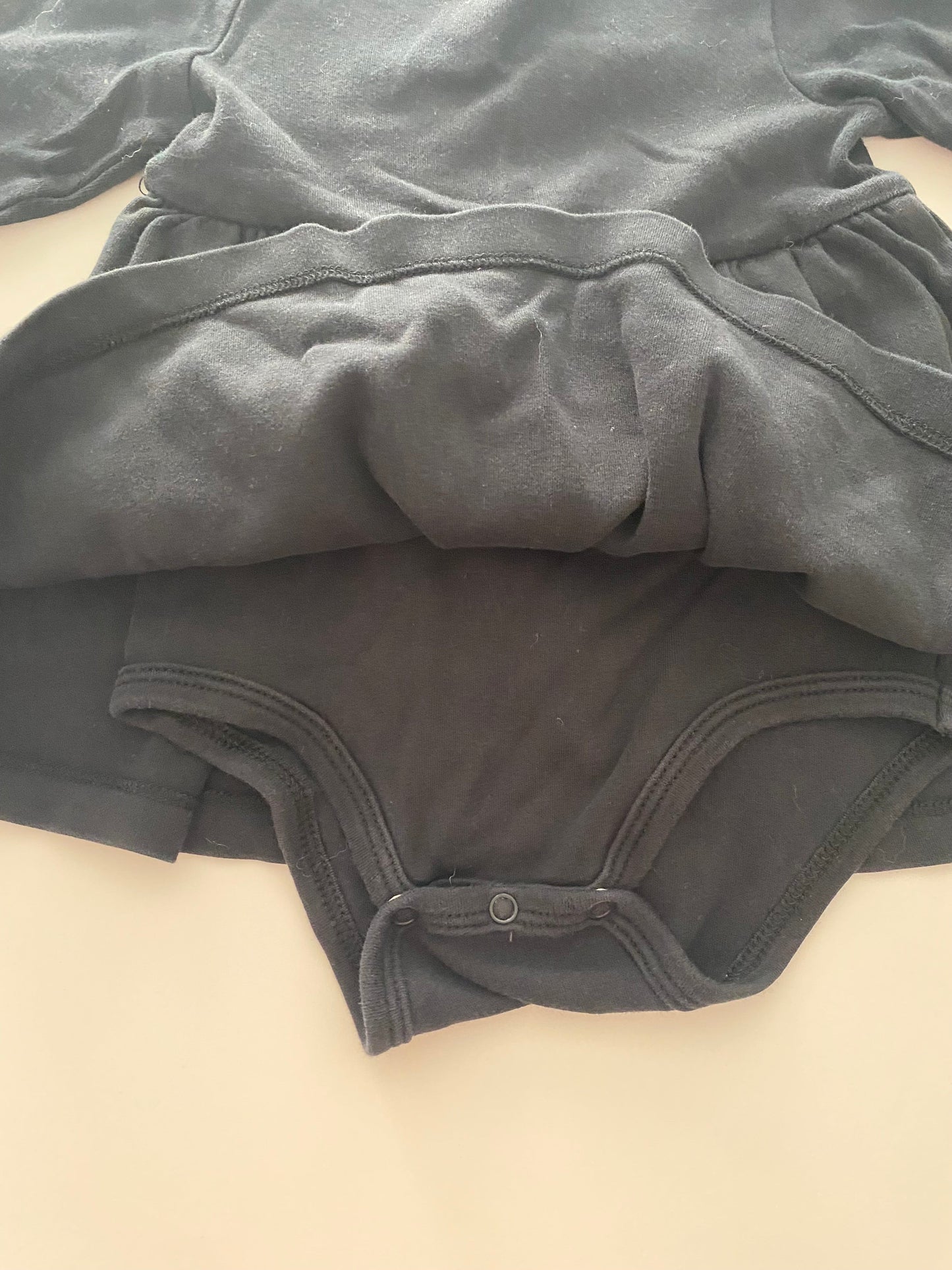 #117- Girls 12M, Primary black onesie dress, VGUC,*reduced*
