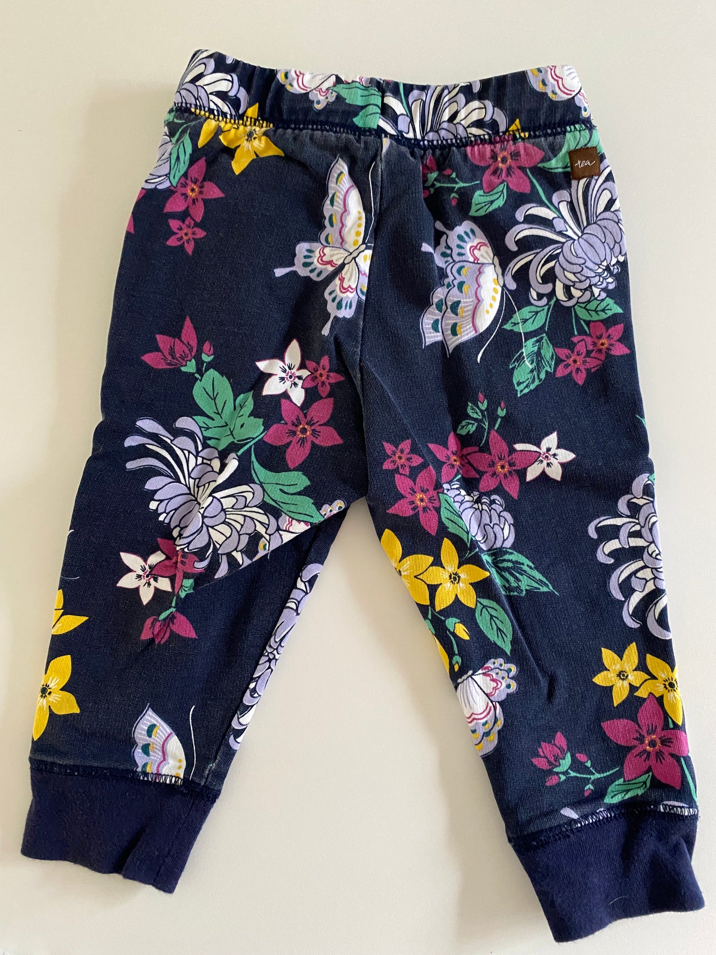 #84B- Girls 12M, Tea navy floral sweatpants and Cat&Jack leopard sweatpants, GUC