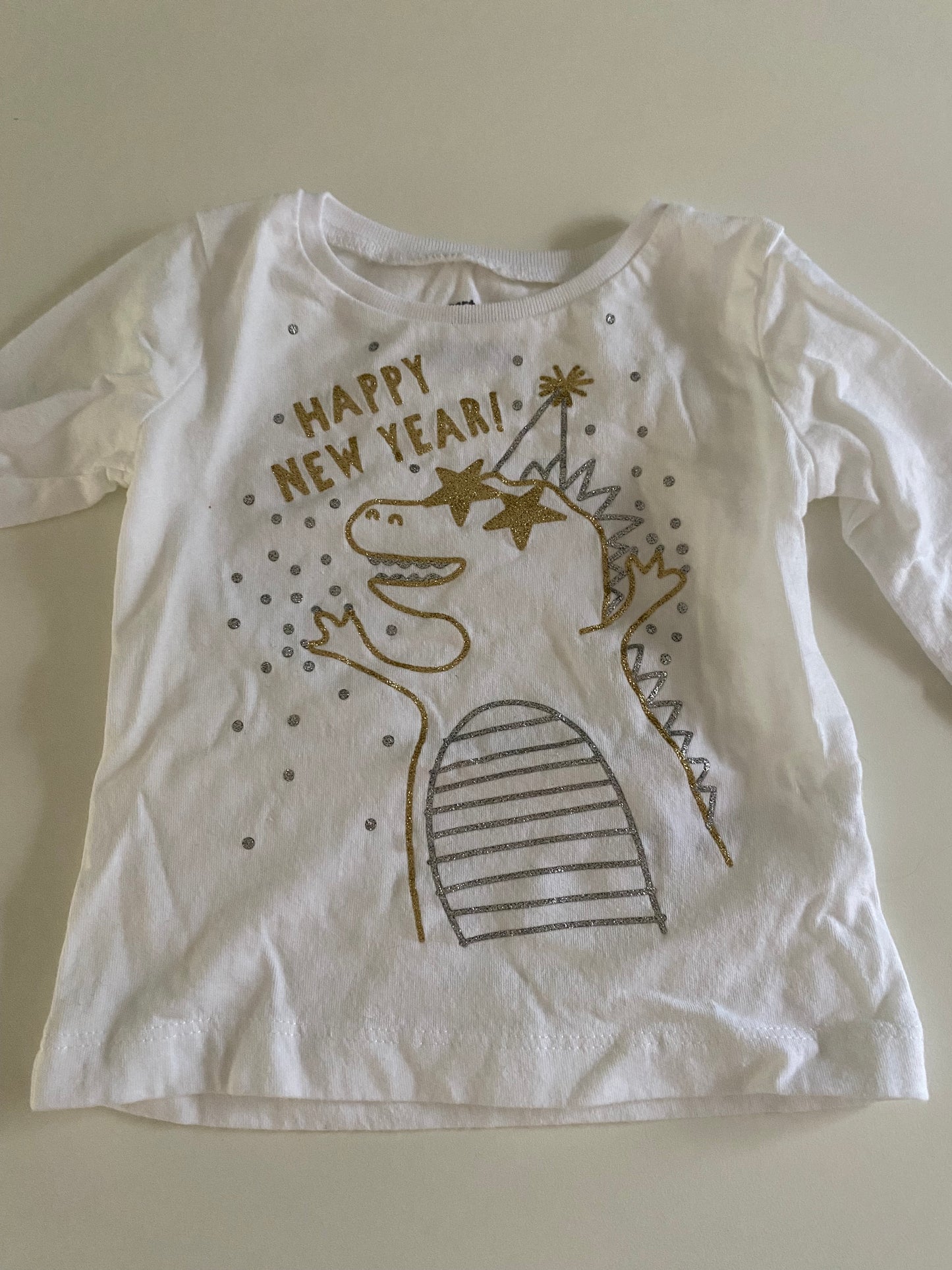 #84B- Girls 9M, Carter’s dinosaur happy new year shirt, EUC