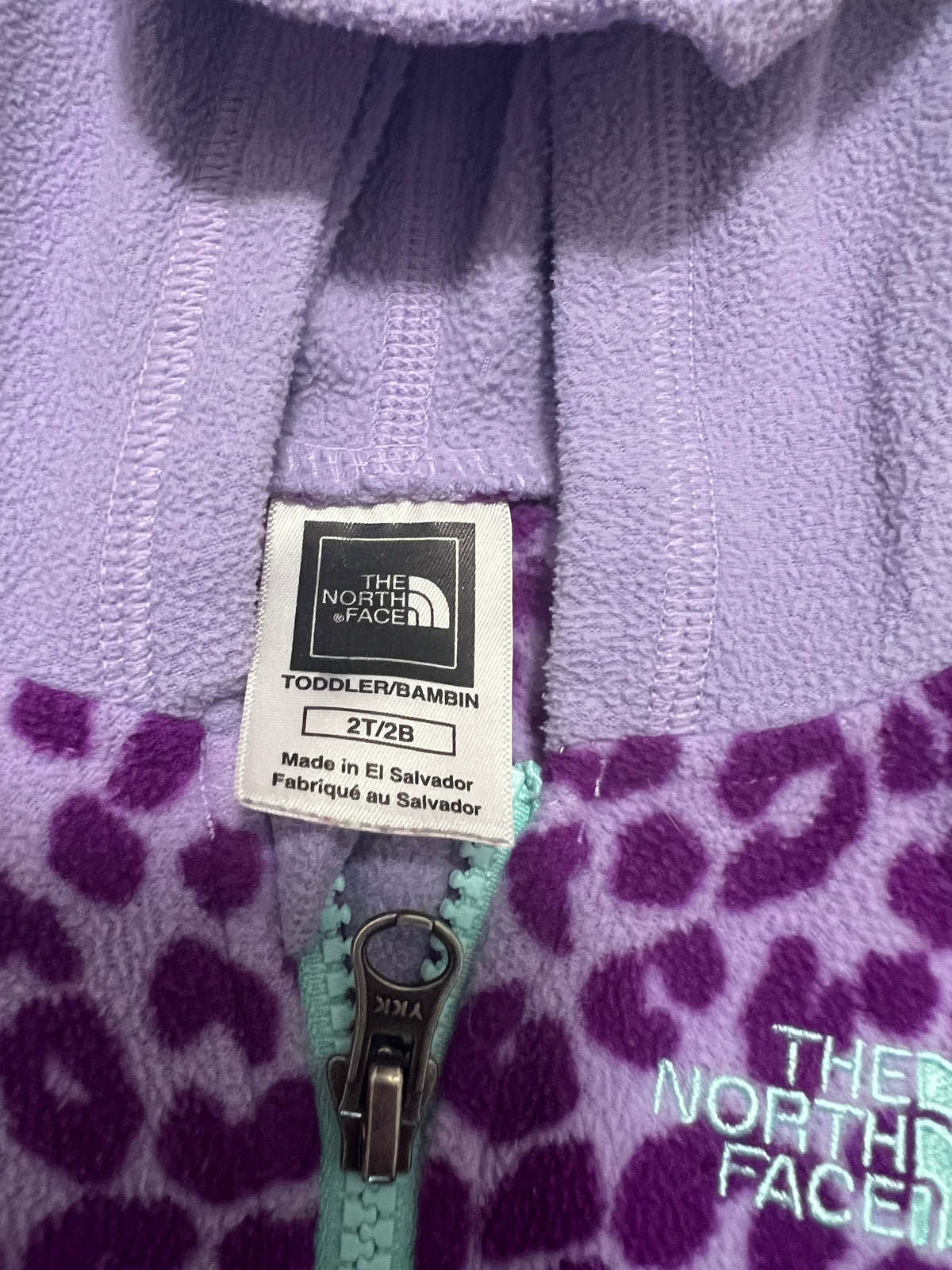 Seller #184 Girls 2T North Face purple cheetah zip up jacket