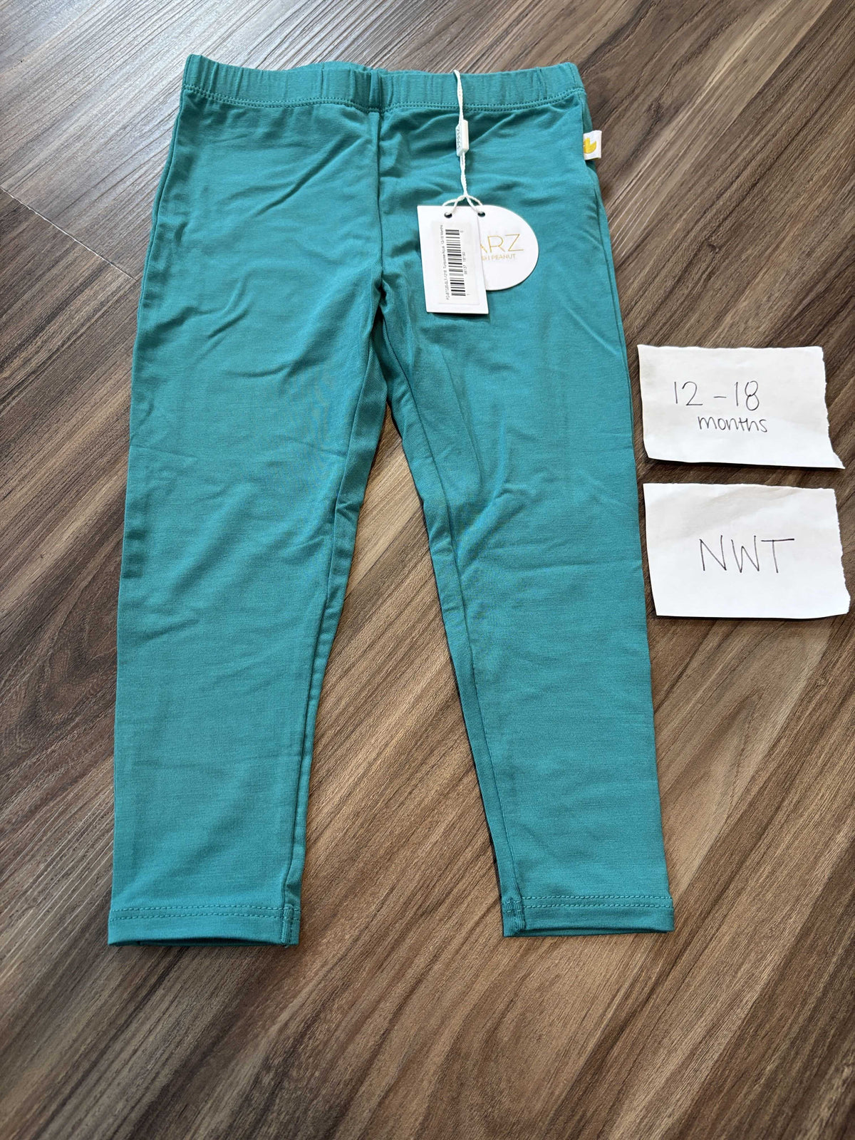 #138 - 12-18 Mo EUC/NWT Bamboo (Posh Peanut) (2) Pants