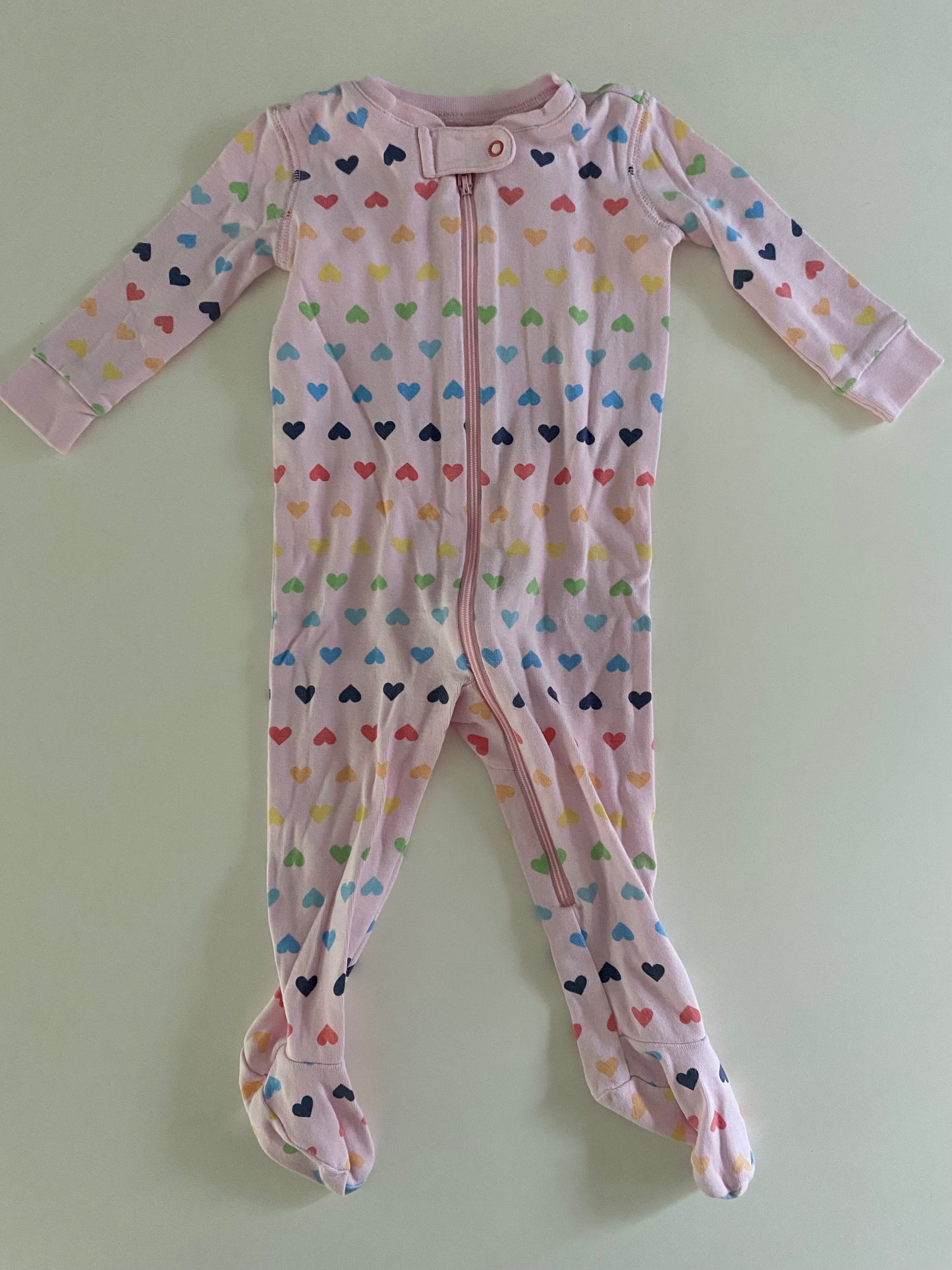 #84B- Girls 6-9M, Primary Pink Rainbow Heart Footed Pajamas, EUC