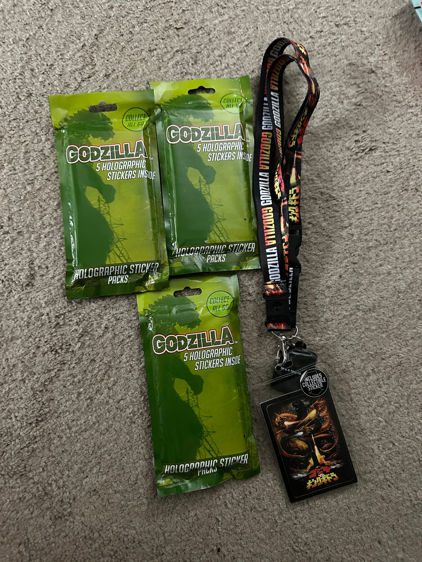 #218 nip Godzilla cards and lanyard