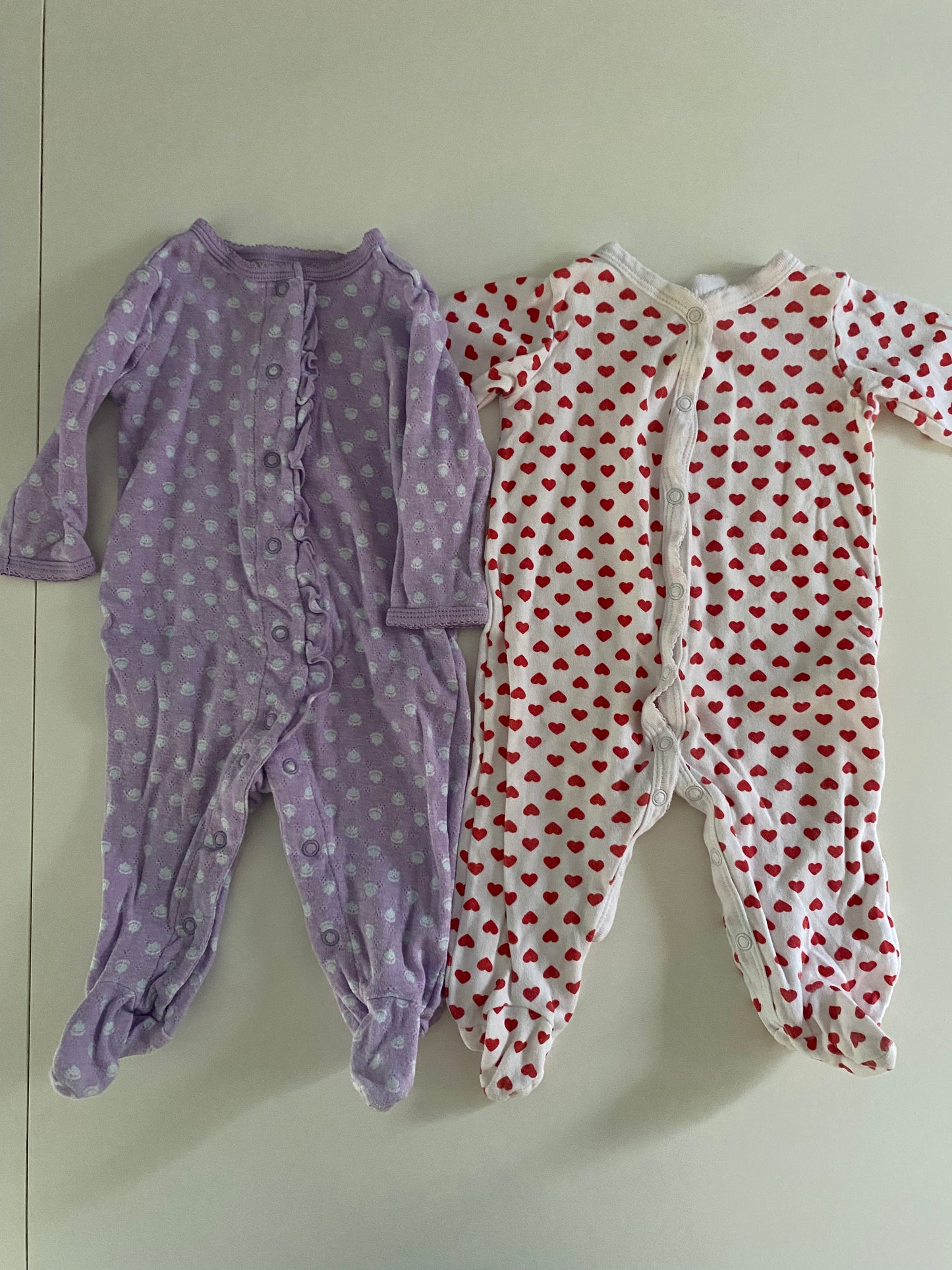 #84B- Girls 6M, Carter’s purple flower and heart footed pajamas, set of 2, VGUC