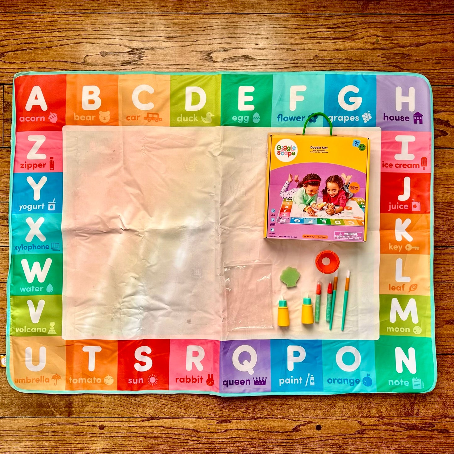 #95 Giggle Scape Doodle Mat with brush pens, paint brushes and markers