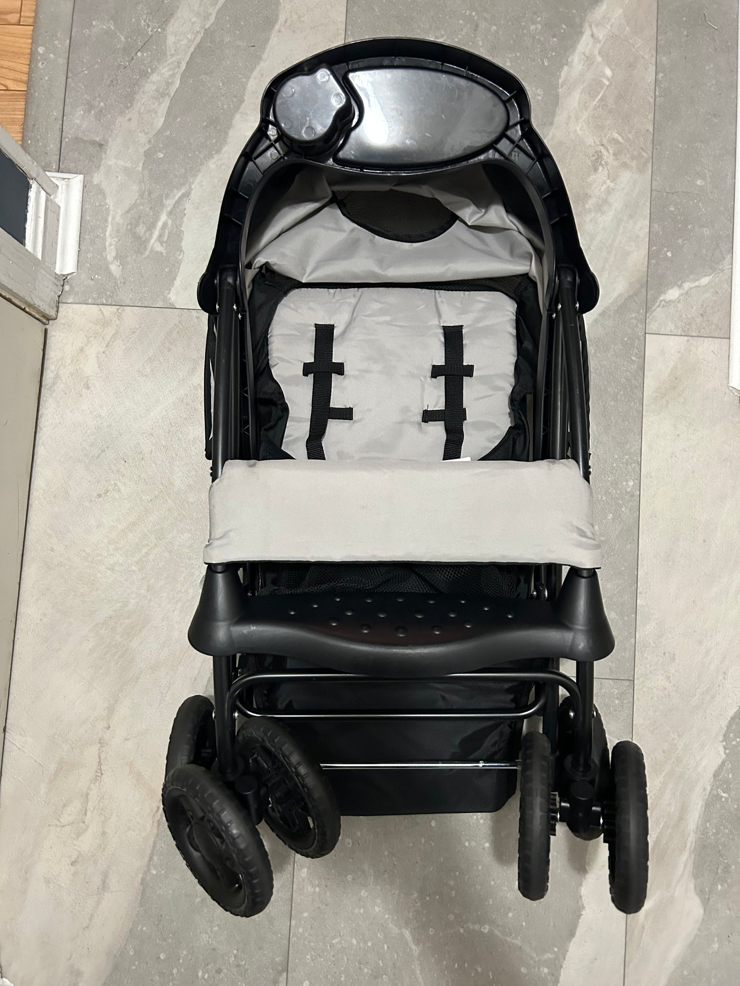 Seller 128 - Kolcraft Lightweight Stroller