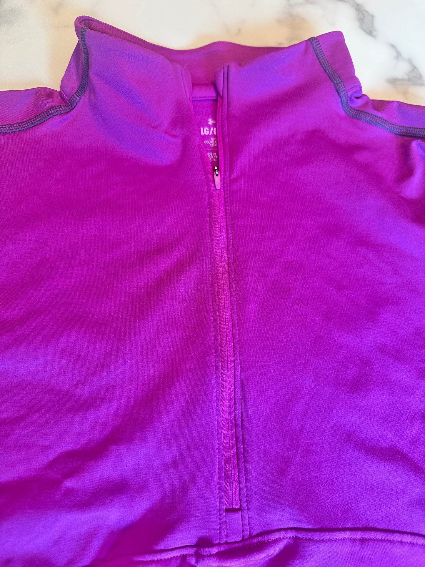 Seller #65 Women’s Large Under Armour half zip top
