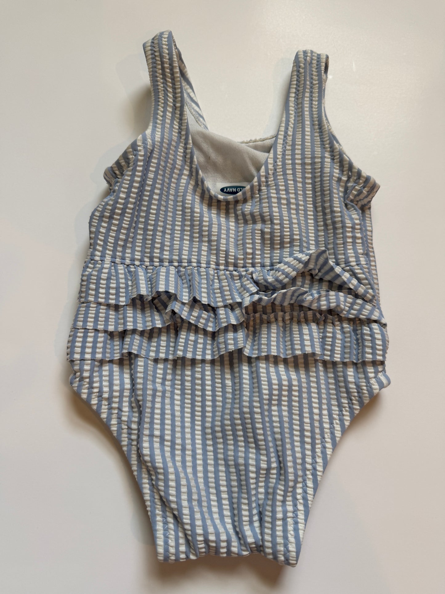 #116 old navy blue and white seersucker swimsuit girls 0-3 months
