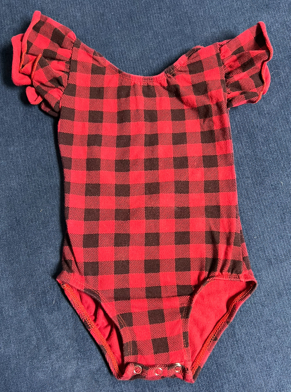 #66 girls Chloe and Piper Buffalo Plaid bodysuit. No size listed but fits like 18mo. Snaps at crotch, ruffle sleeve, VGUC