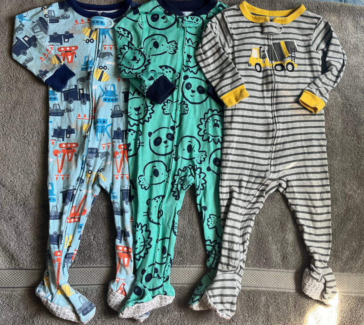 Seller #13 Carter’s boys 12 months sleeper pajamas bundle