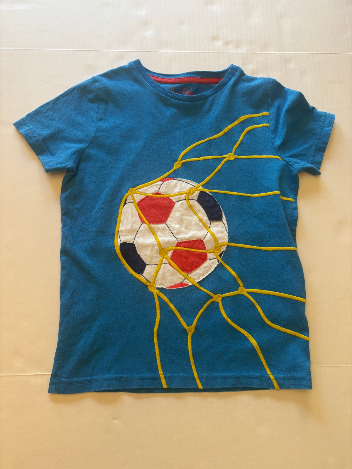 Seller 118 VGUC Boys Mini Boden Soccer tshirt size 7/8. FIts more like a 7
