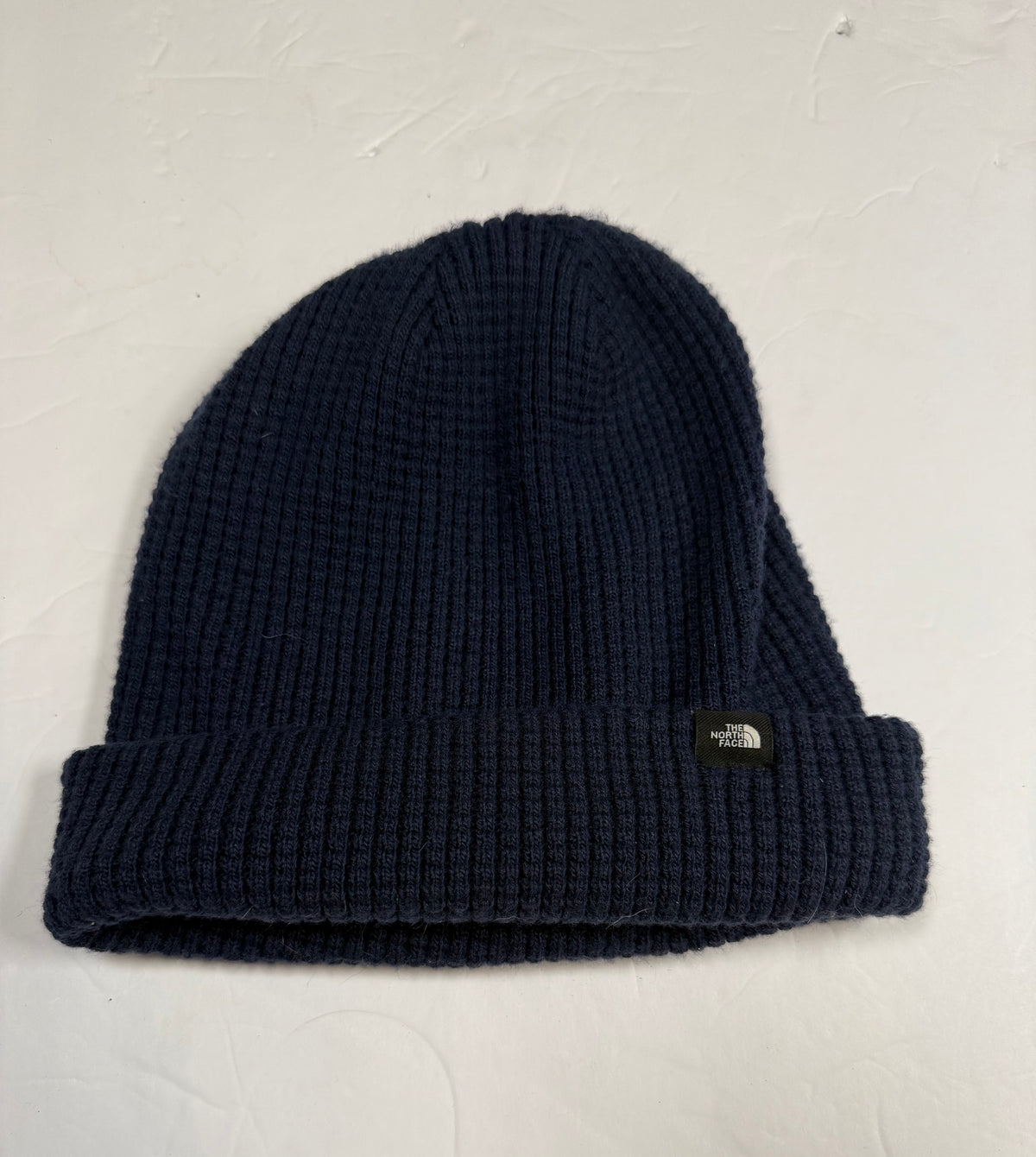 #141 Kids navy the north face logo lined beanie