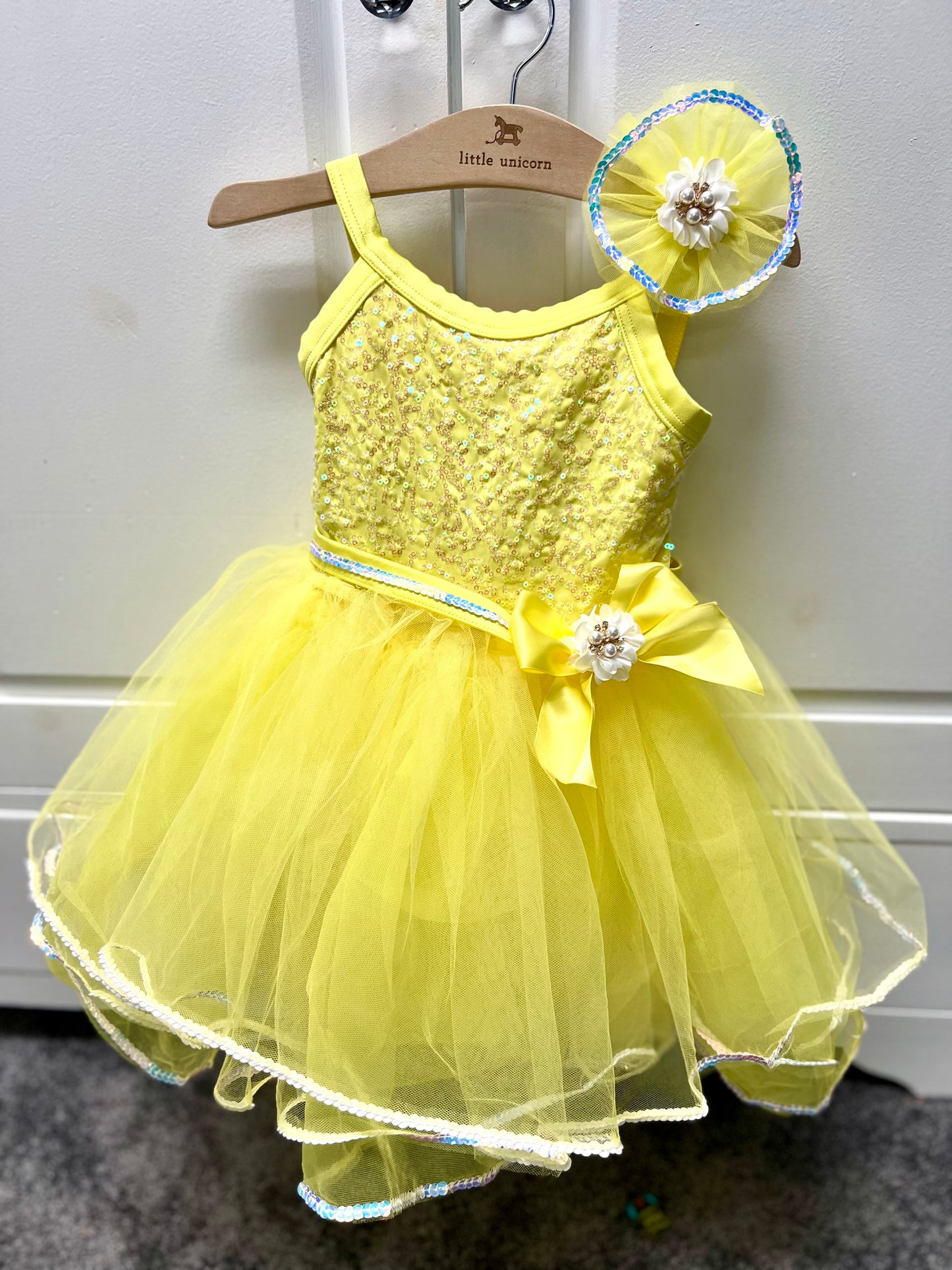 Yellow sequin dance costume with coordinating hairpiece with gemstones. EUC (worn once). Size XS (fits 3-4yr best).