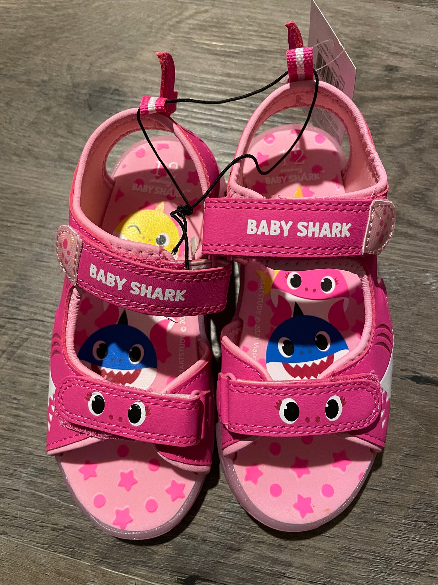 New little girl size 12 baby shark light up sandals.