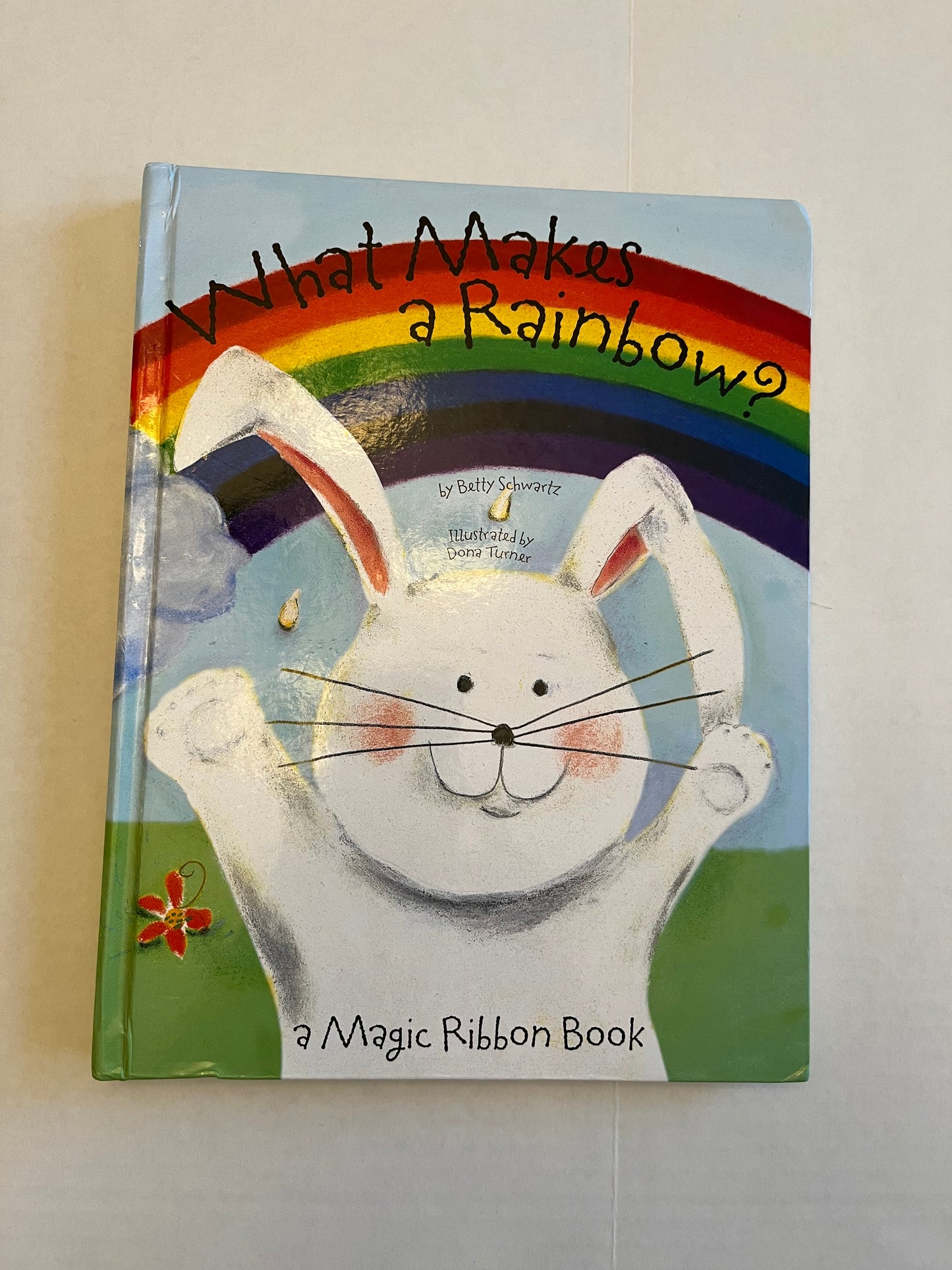 What makes a rainbow book. Ribbons appear when page is turned to make a rainbow. PPU Mariemont