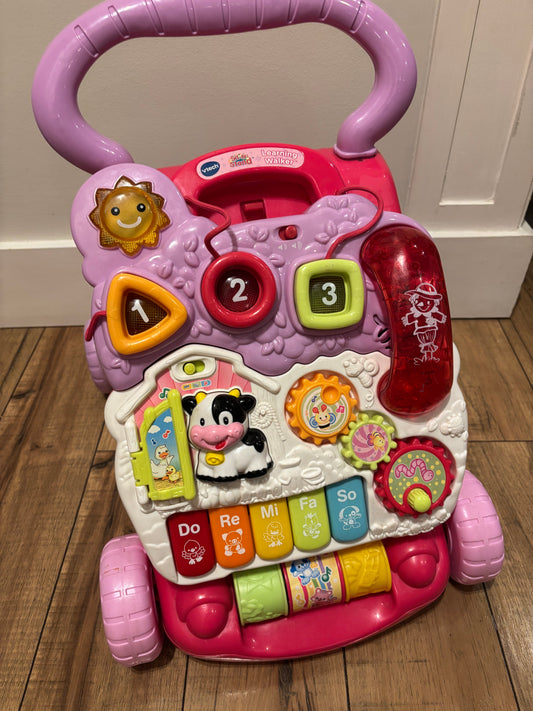 #70 VTech sit to stand learning walker