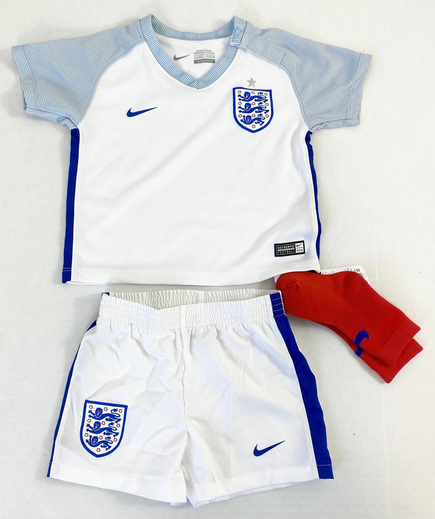9-12 months official England Nike soccer outfit. Shirt, shorts and socks