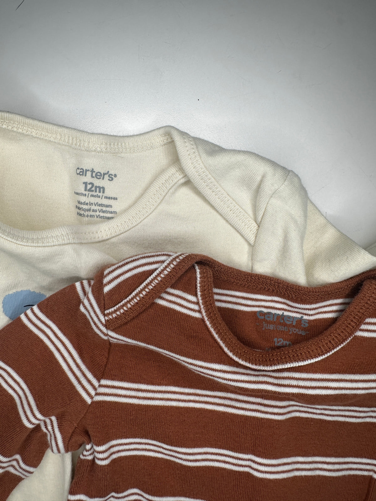 Seller #40 Carter's long-sleeve onesie bundle size 12 month