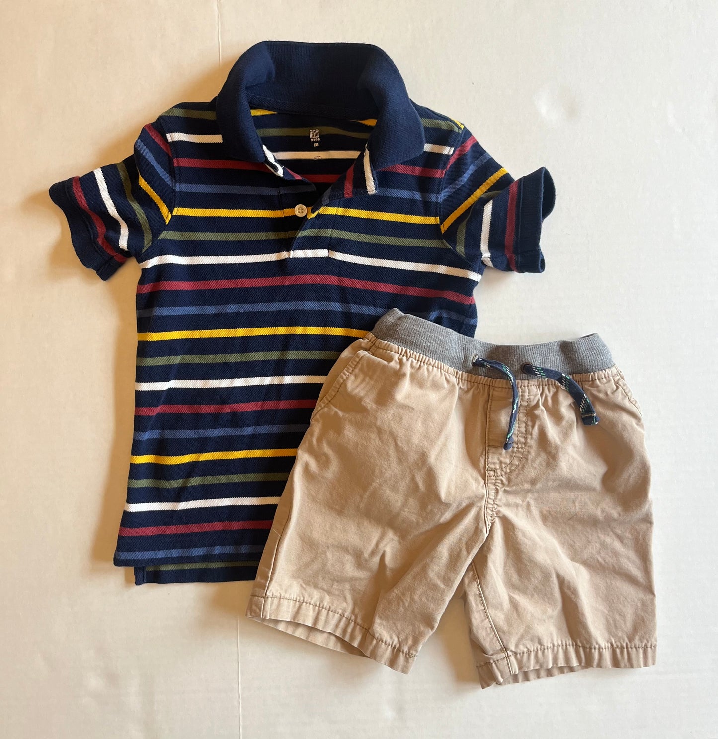 Reduced! Gap striped polo size xs (4/5) and Carter’s khaki shorts size 4T. PPU Mariemont