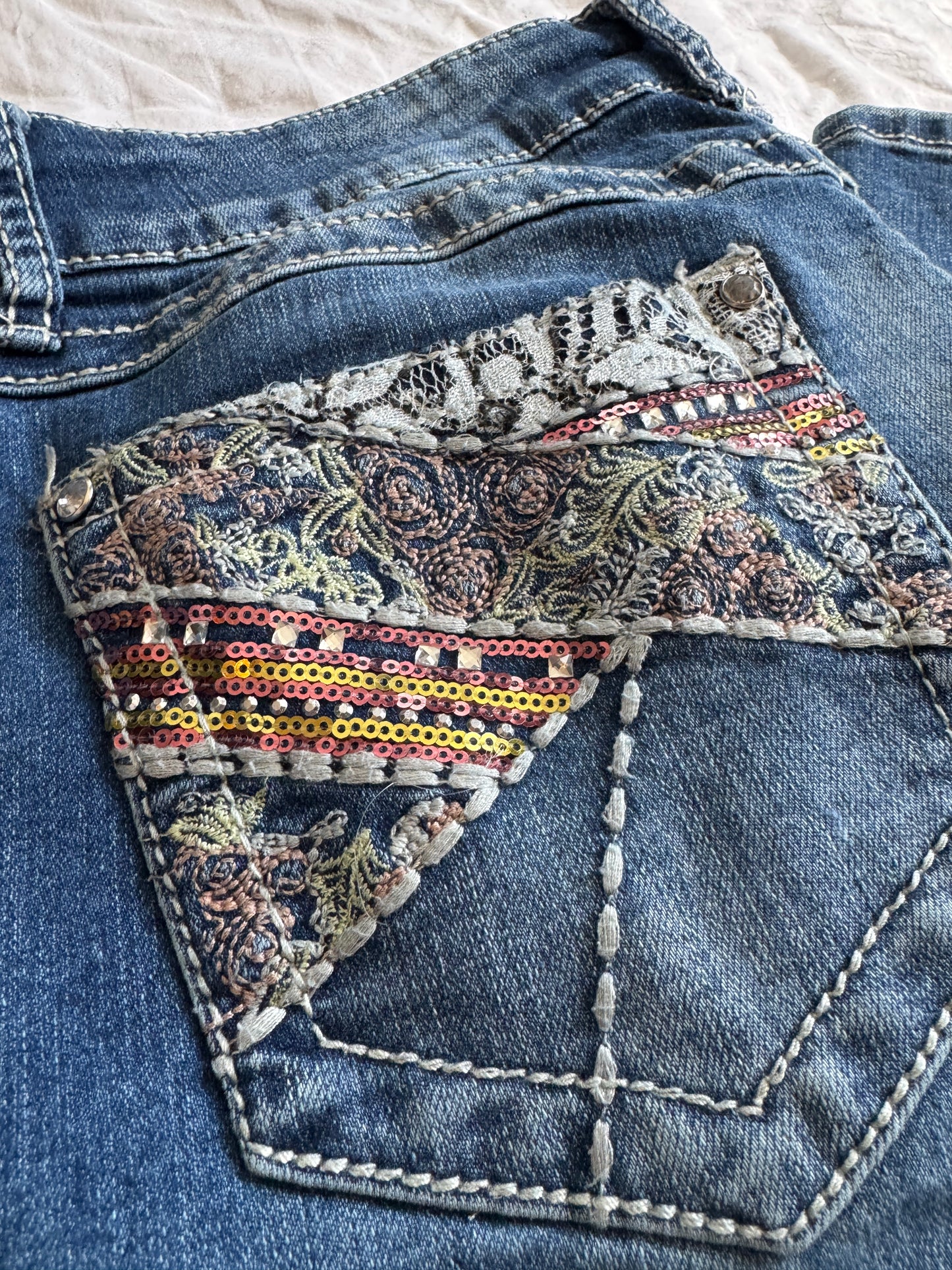 Seller #22 - Embellished pocket jeans - women’s size 14 - GUC