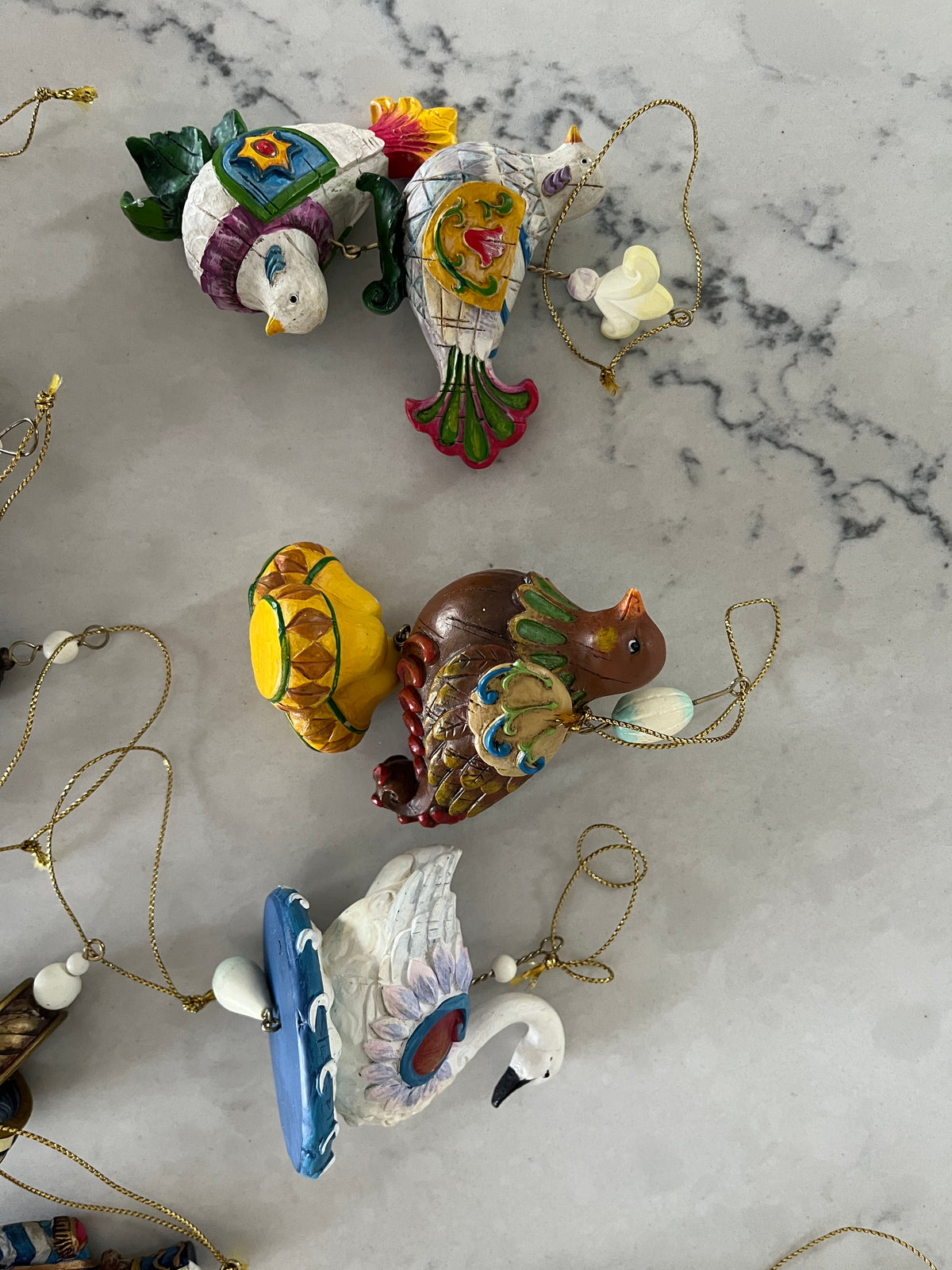 135  The 12 days of Christmas ornament set, multiple pictures, no chips or broken ornaments