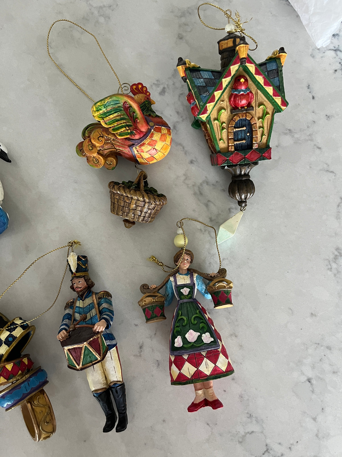 135  The 12 days of Christmas ornament set, multiple pictures, no chips or broken ornaments