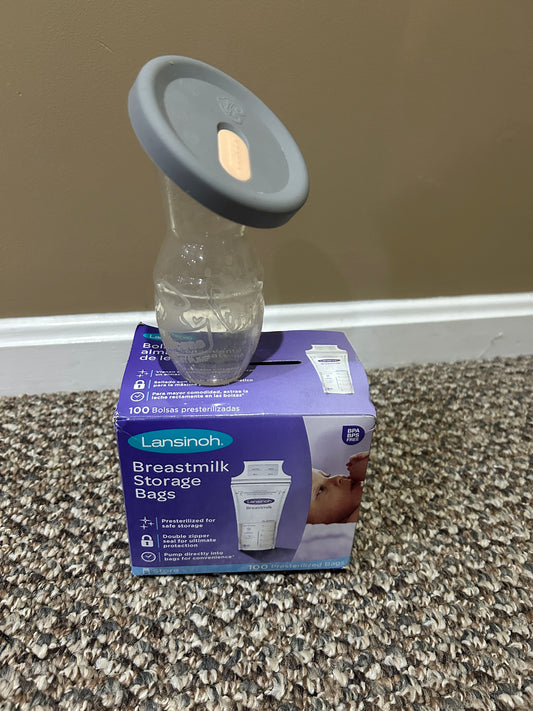 Seller #5 - Haakaa Manual Breast Pump with cover and Milk Storage Bags