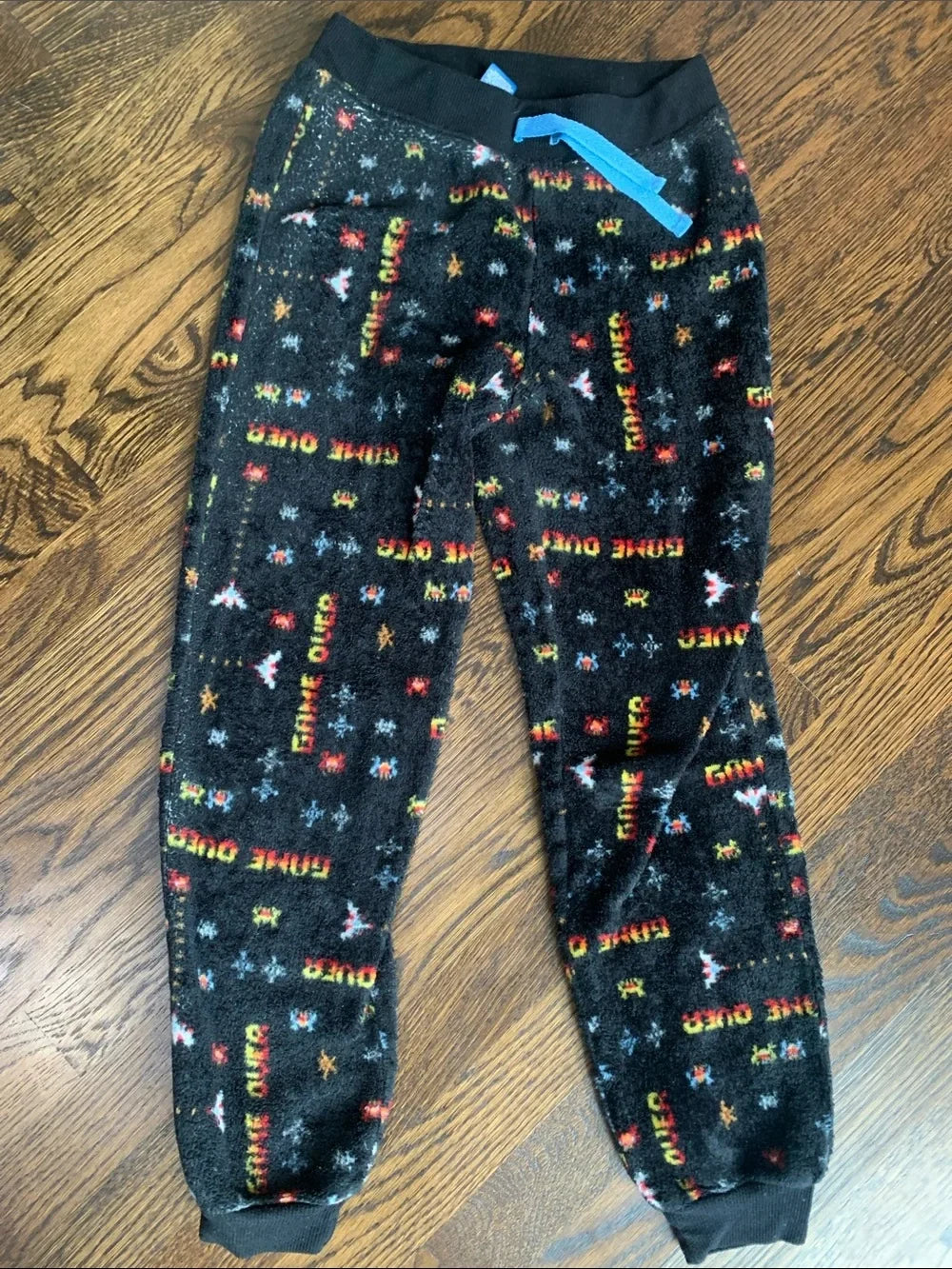#151 - Arizona Black Fleece Jogger Pants with "Game Over" print. Size Med (10/12)