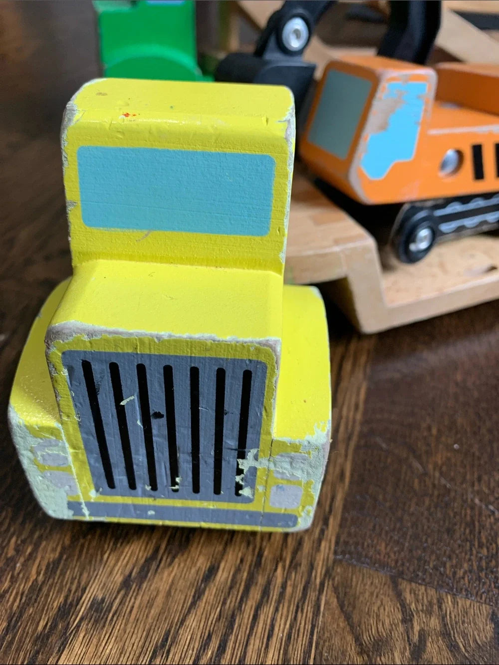 #151 - Melissa & Doug Wooden Construction Trucks in Yellow, Orange, Green, Black - Paint damage