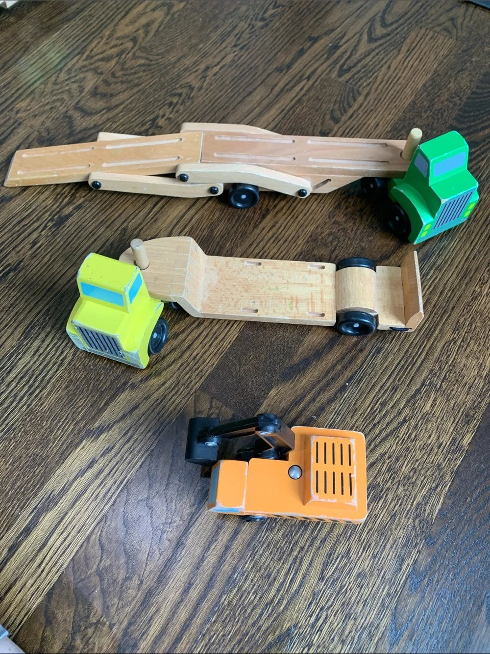 #151 - Melissa & Doug Wooden Construction Trucks in Yellow, Orange, Green, Black - Paint damage