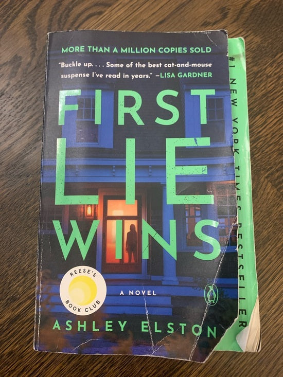 #48 - First Lie Wins Paperback Book