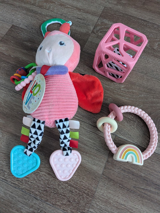 #144 - Lot of baby toys (teething ring, love bug)
