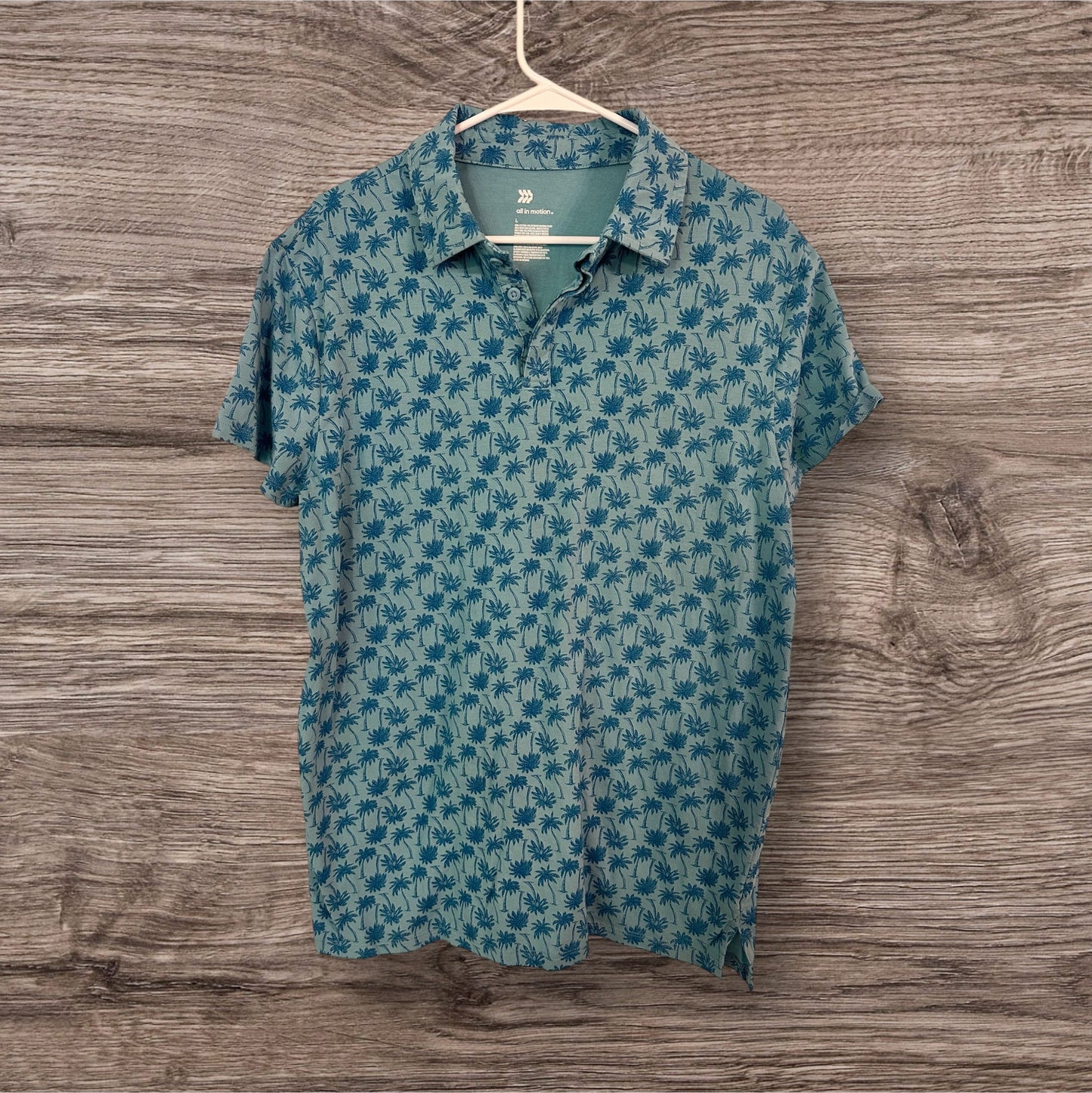 #169 Men’s Large All in Motion Polo *REDUCED PRICE