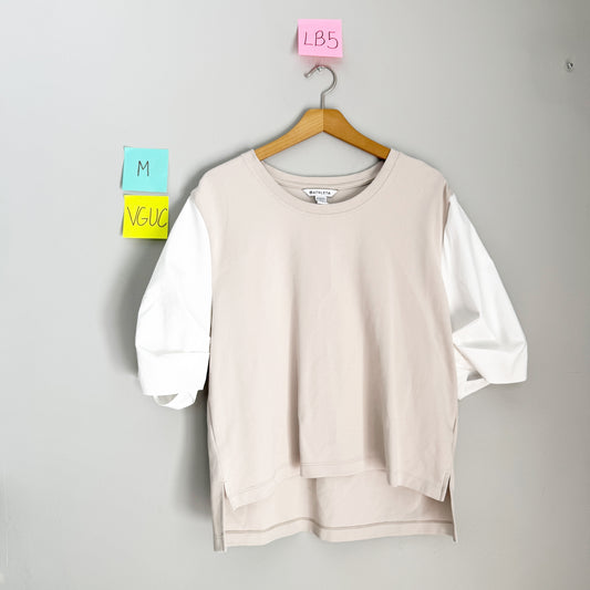 Seller 196 Athleta puff sleeved top M