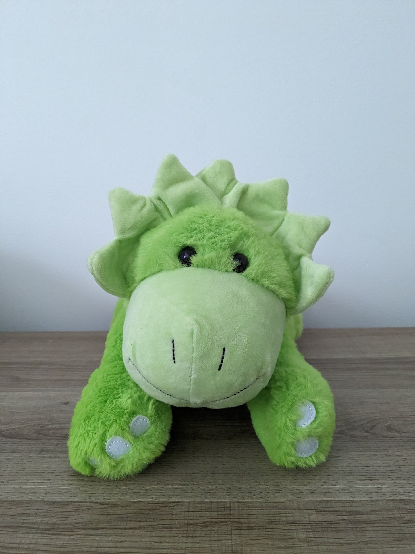 Plush dino that sings and lights up