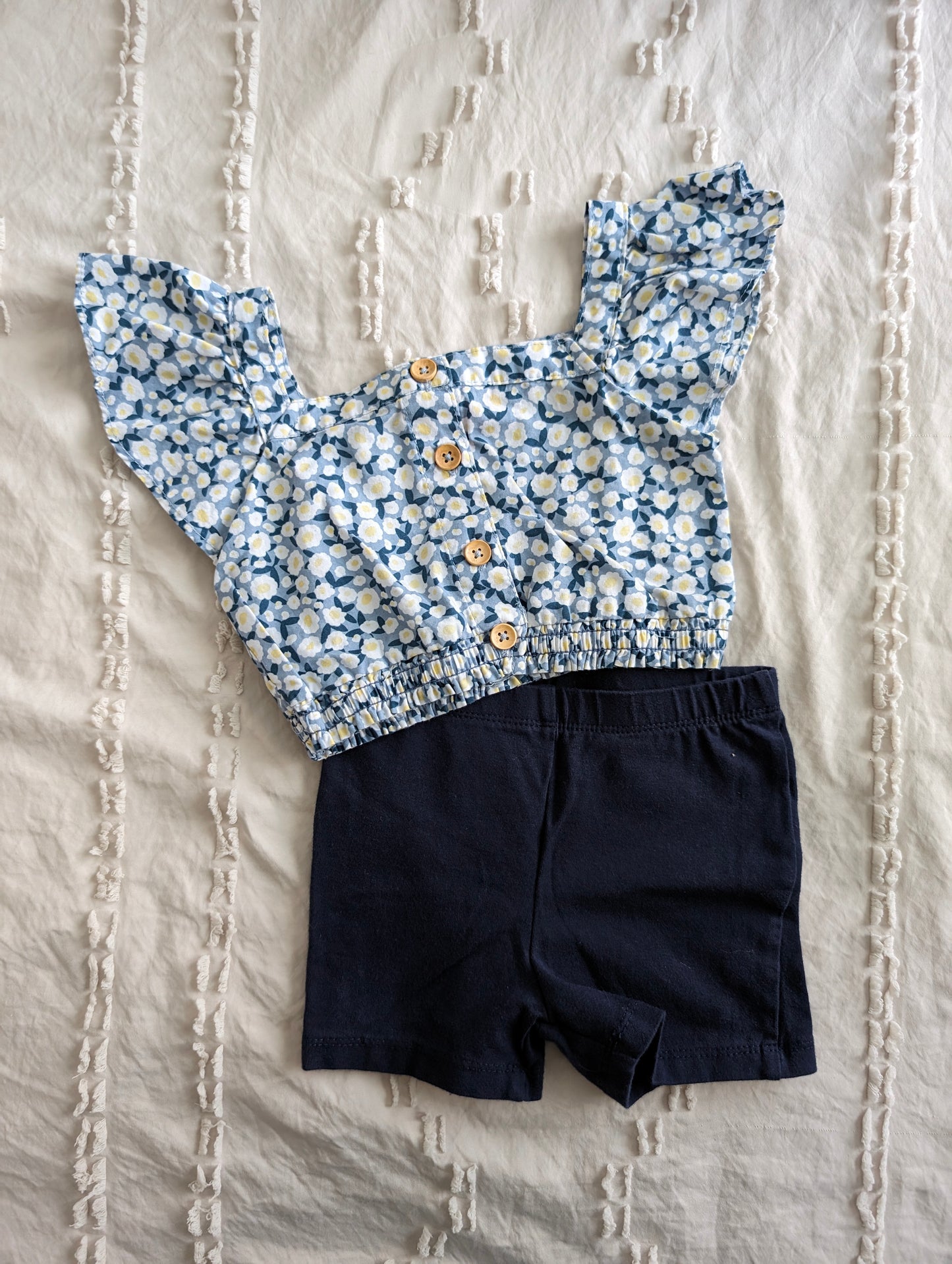 2-piece outfit, floral navy crop top (2T) + navy bike shorts (2T)