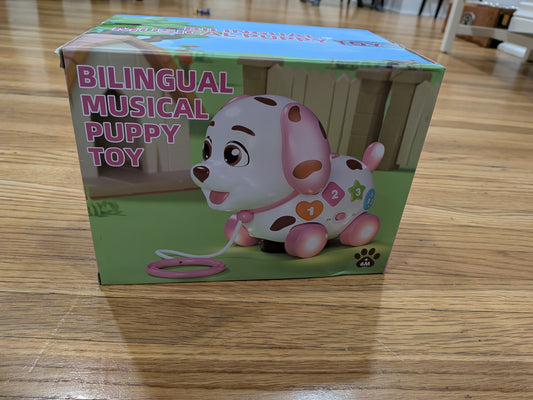 206 Bilingual musical puppy toy- NIB