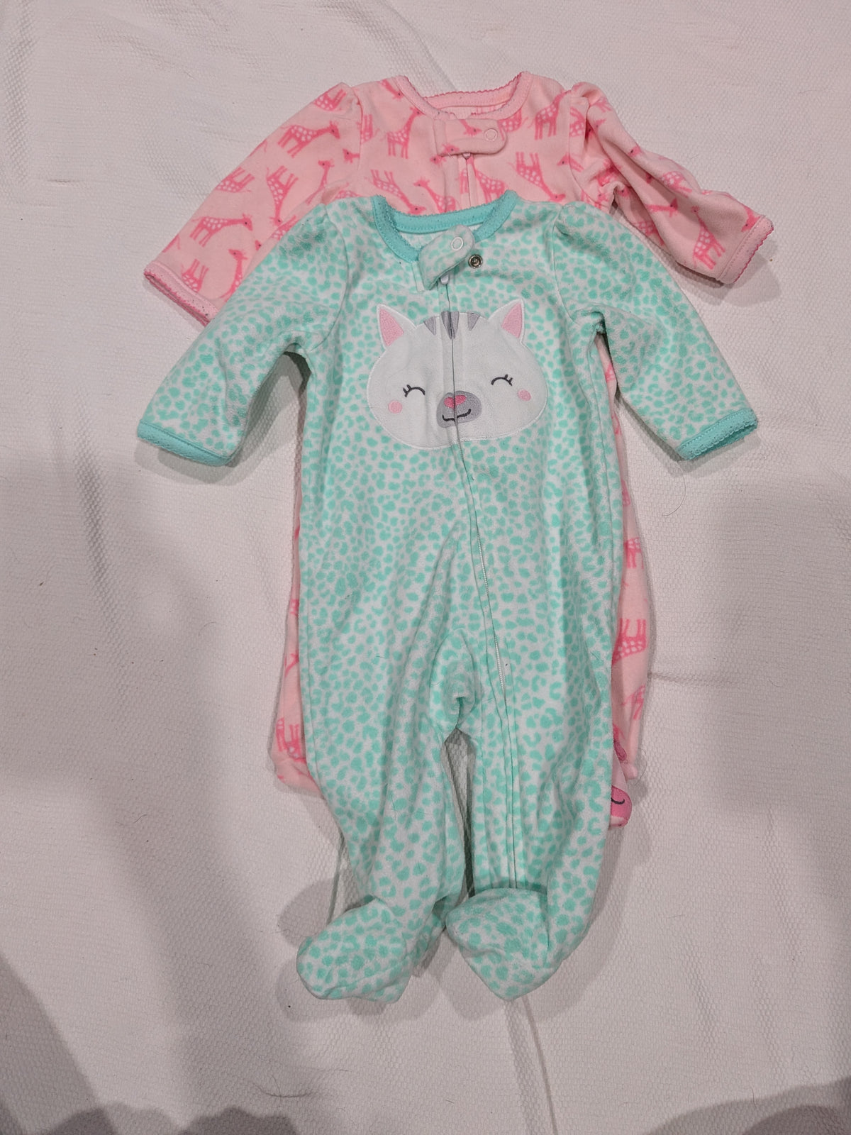 Seller 2. Carters fleece footie pajamas, size 3 months