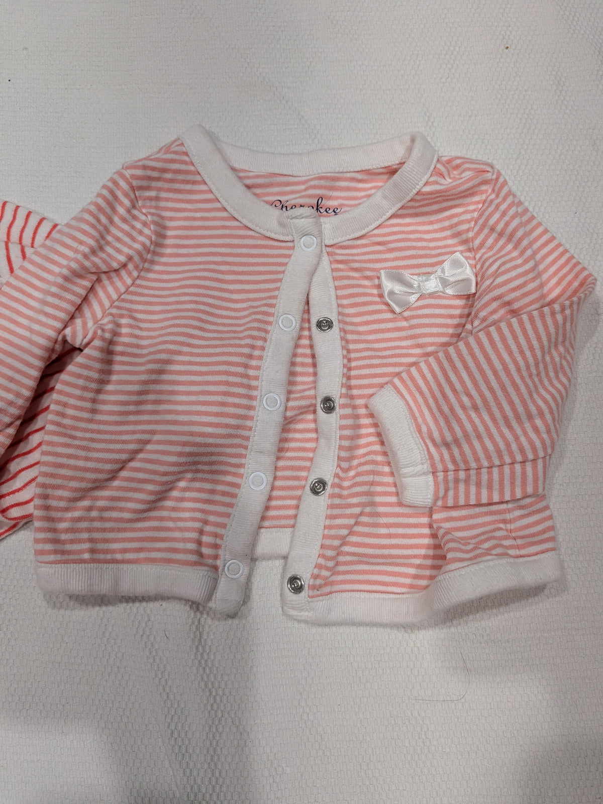 Seller 2. Bundle of baby girl cardigan size 6 months