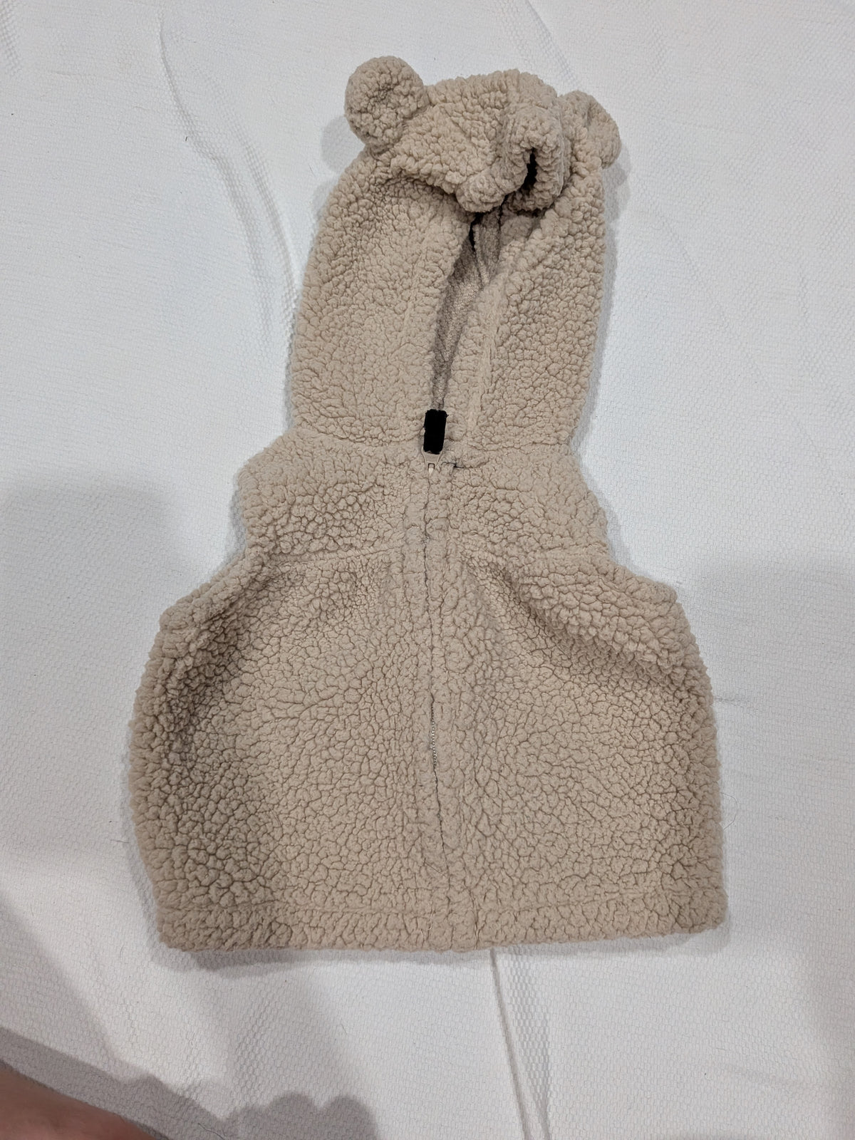 Seller 2. Carters vest 6 months