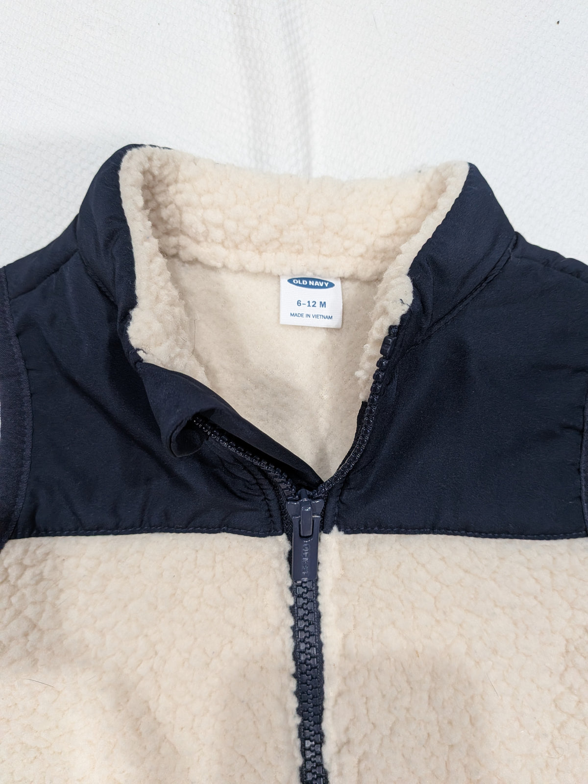 Seller 2. Old Navy vest size 12 months