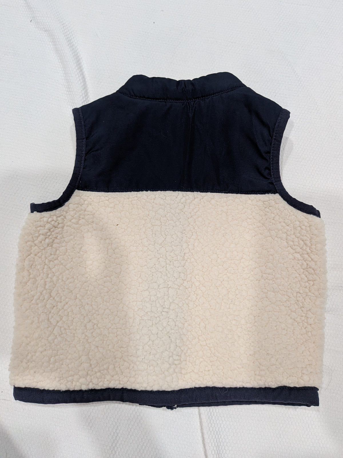 Seller 2. Old Navy vest size 12 months