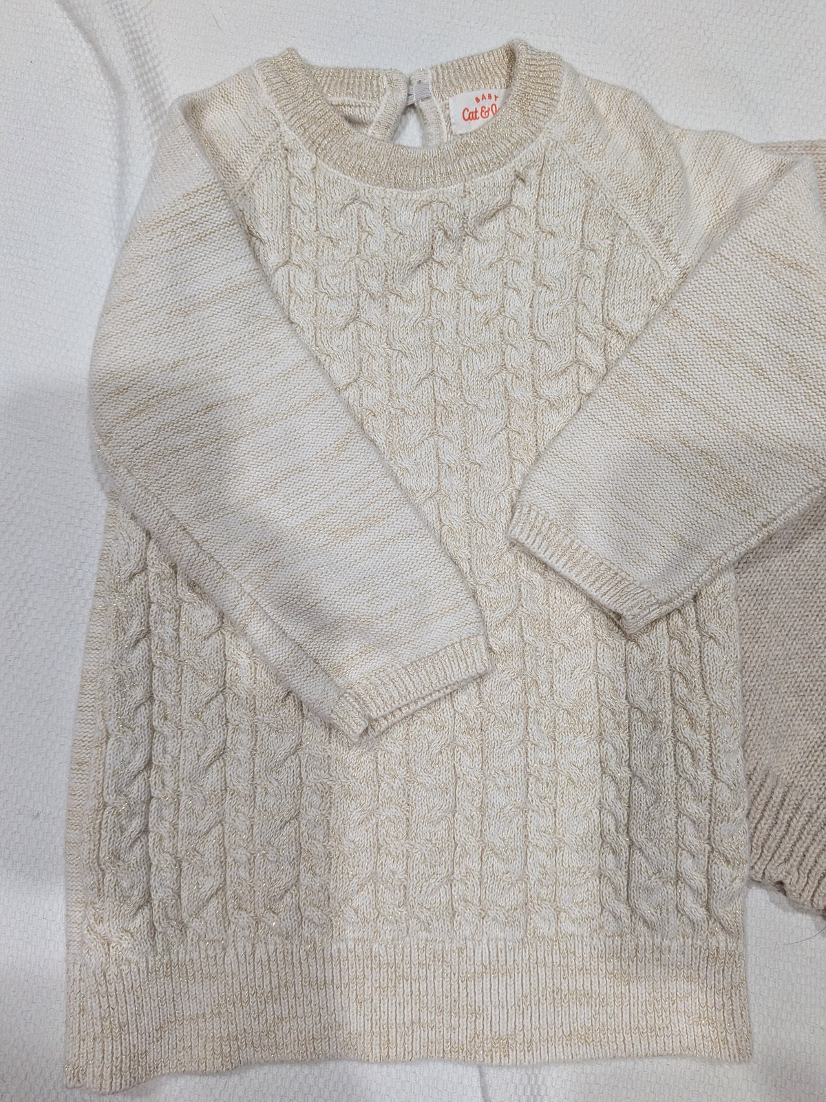 Seller 2. two baby girl sweaters, size 9 months