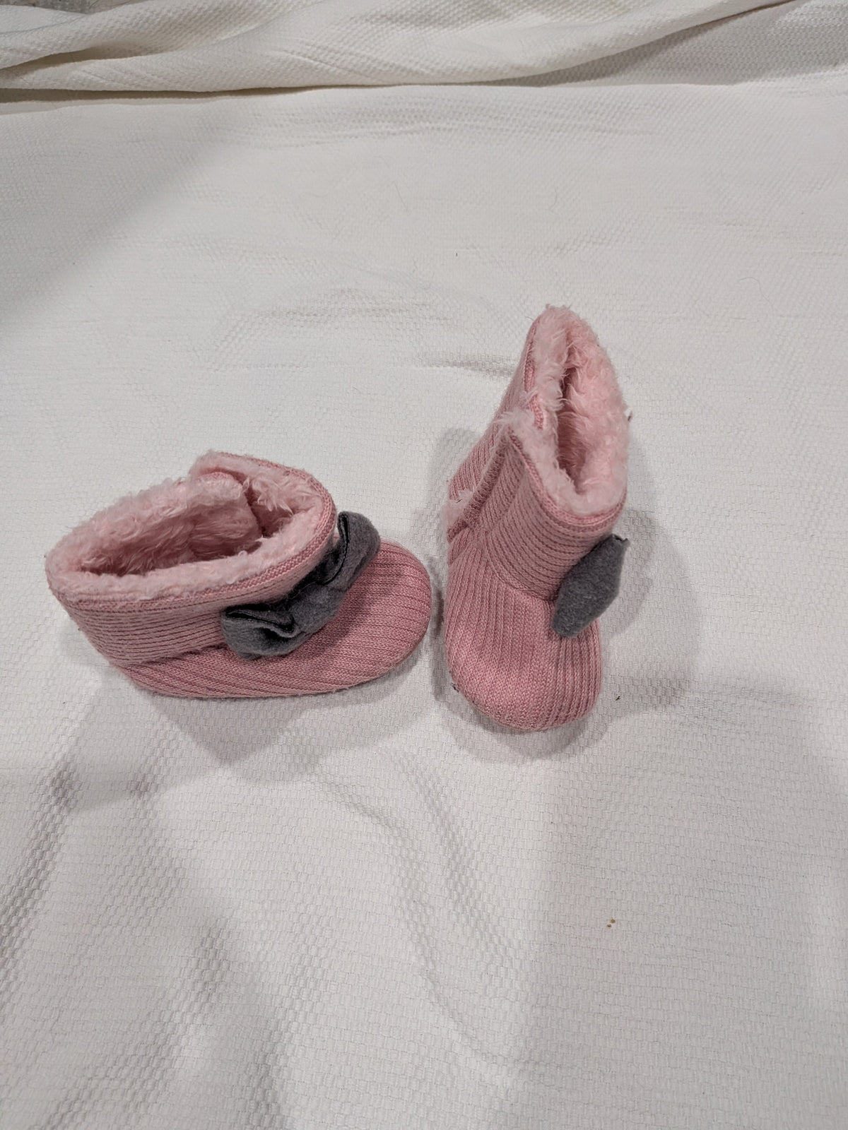 Seller 2. Girl pink booties size 9-18 months