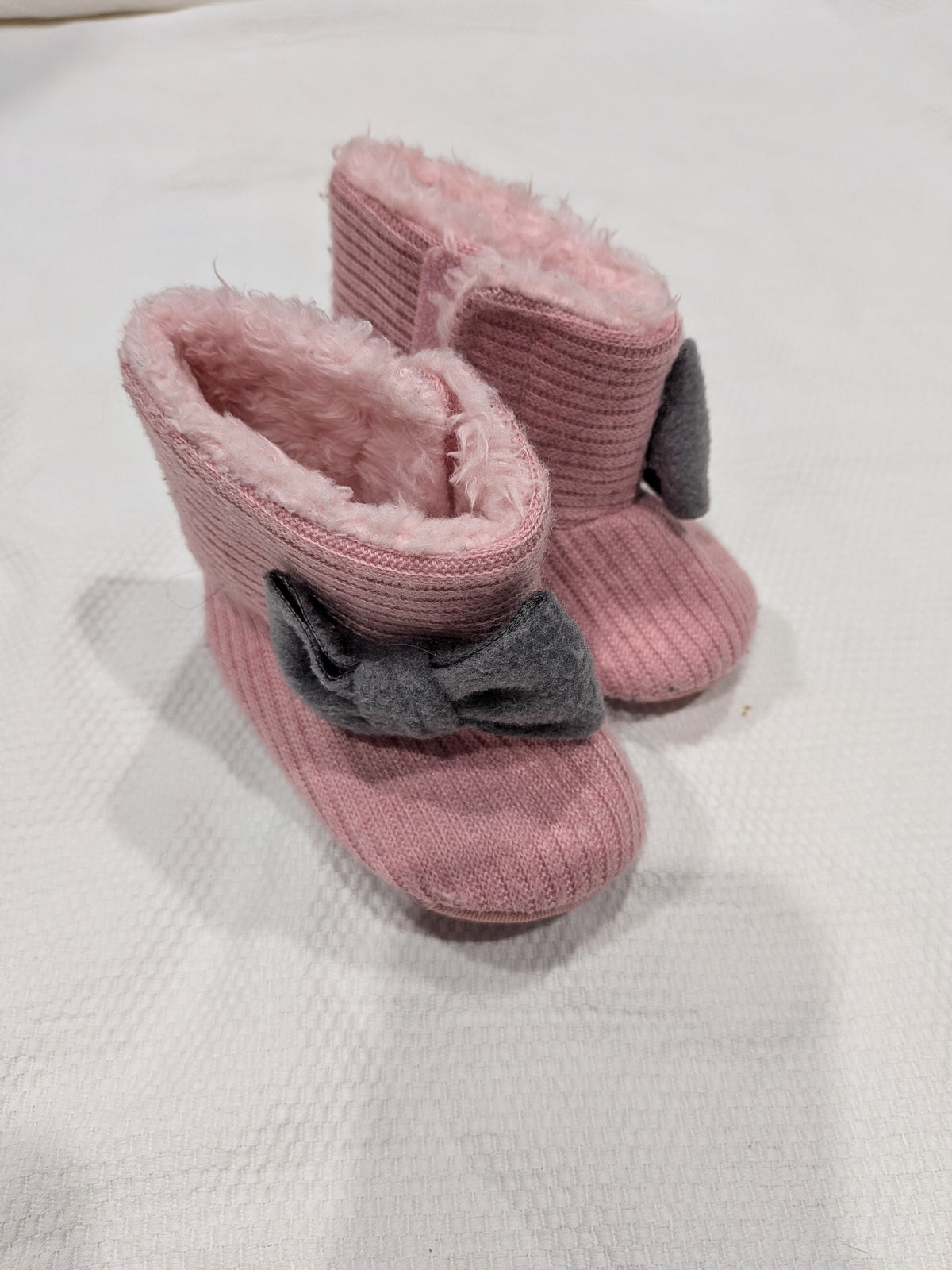 Seller 2. Girl pink booties size 9-18 months