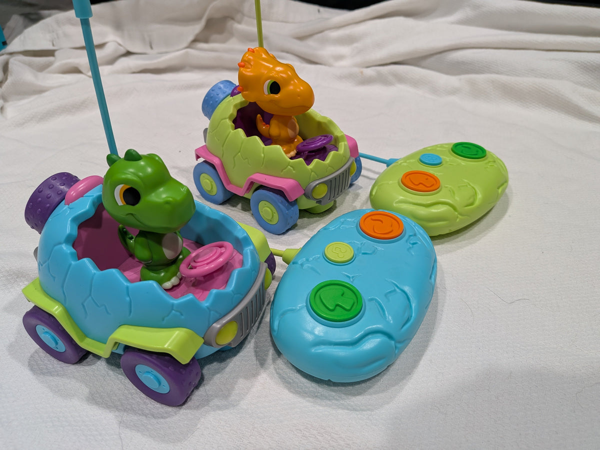 Seller 2. Dino remote control cars with controllers.