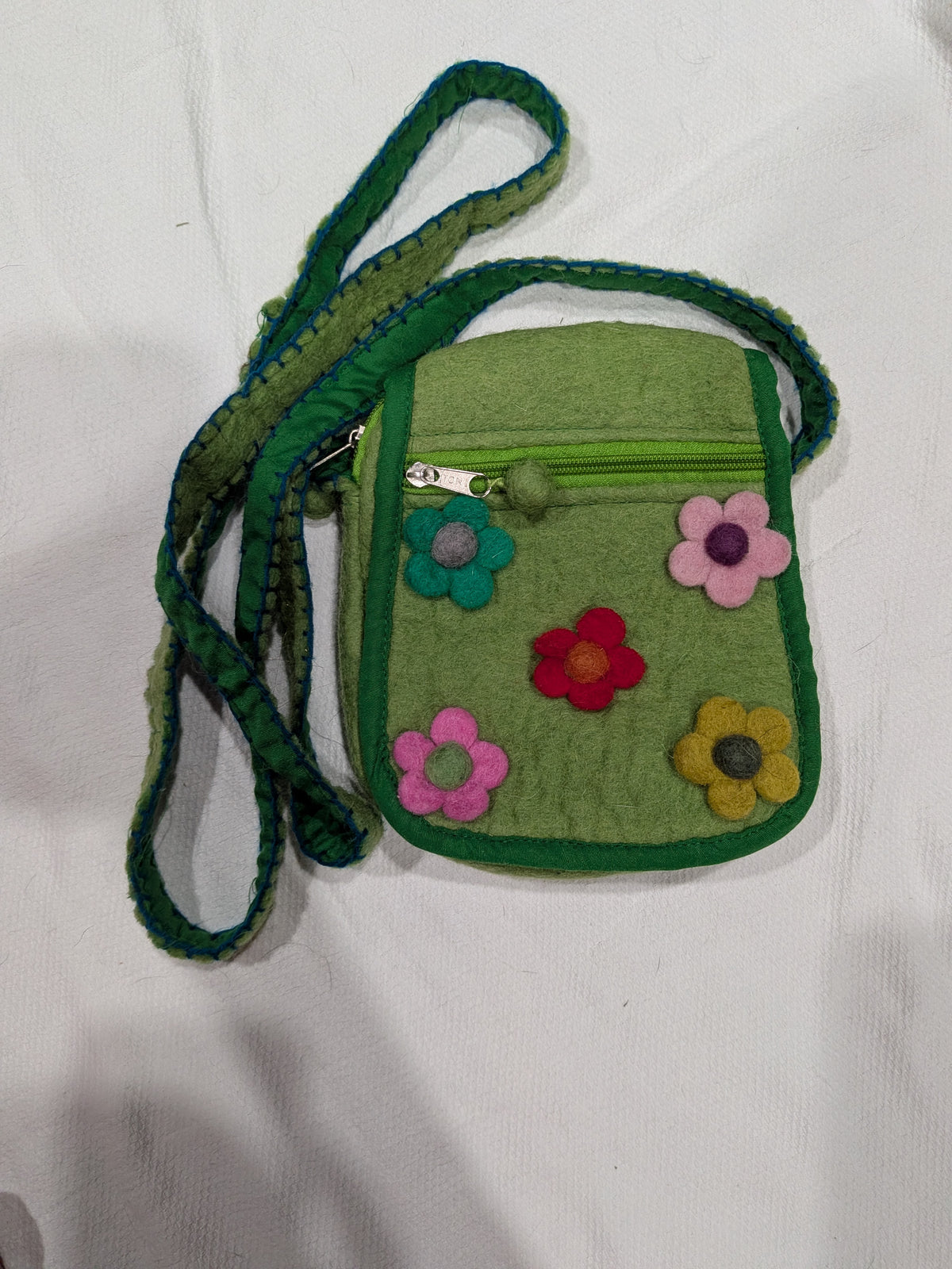 Seller 2. Girls toy green purse with flowers