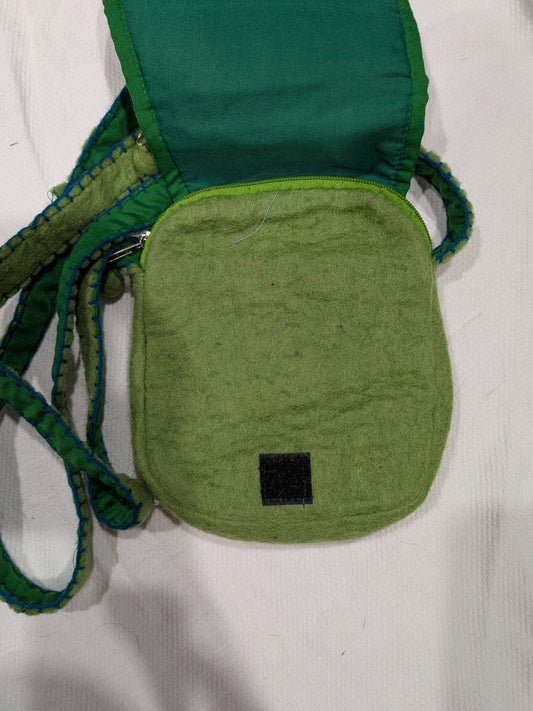Seller 2. Girls toy green purse with flowers