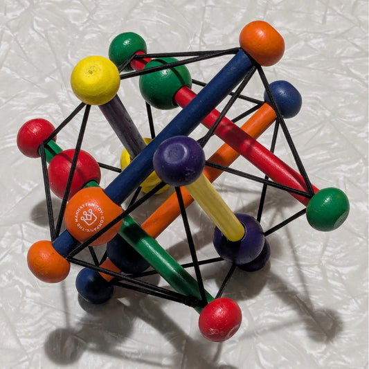 #61 Manhattan Toy Skwish Classic Wooden Rattle and Teether Grasping Activity Toy