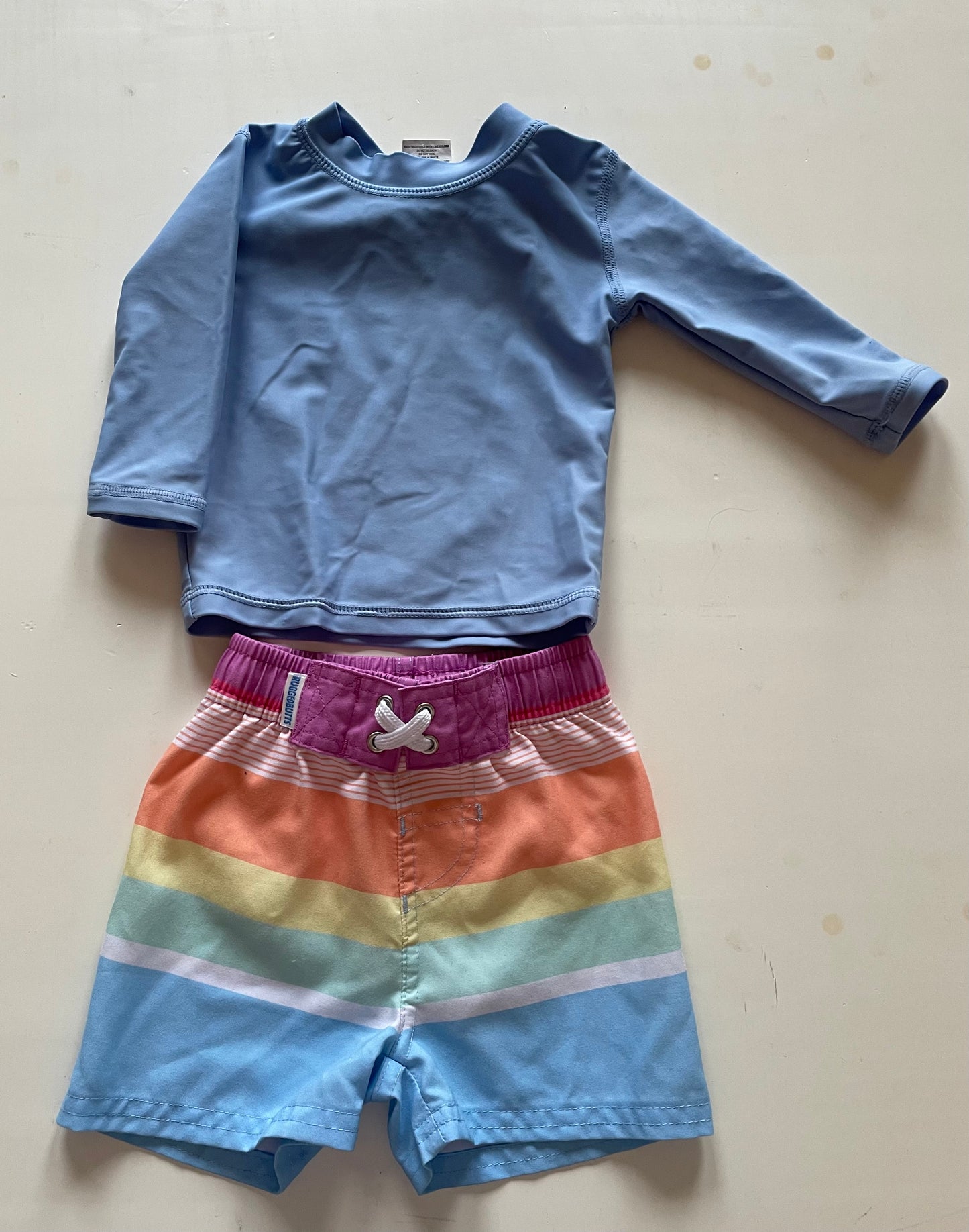 Rugged Butts Boys 3-6M Pastel rainbow/blue bathing suit